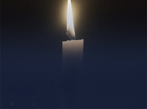 Single lit candle
